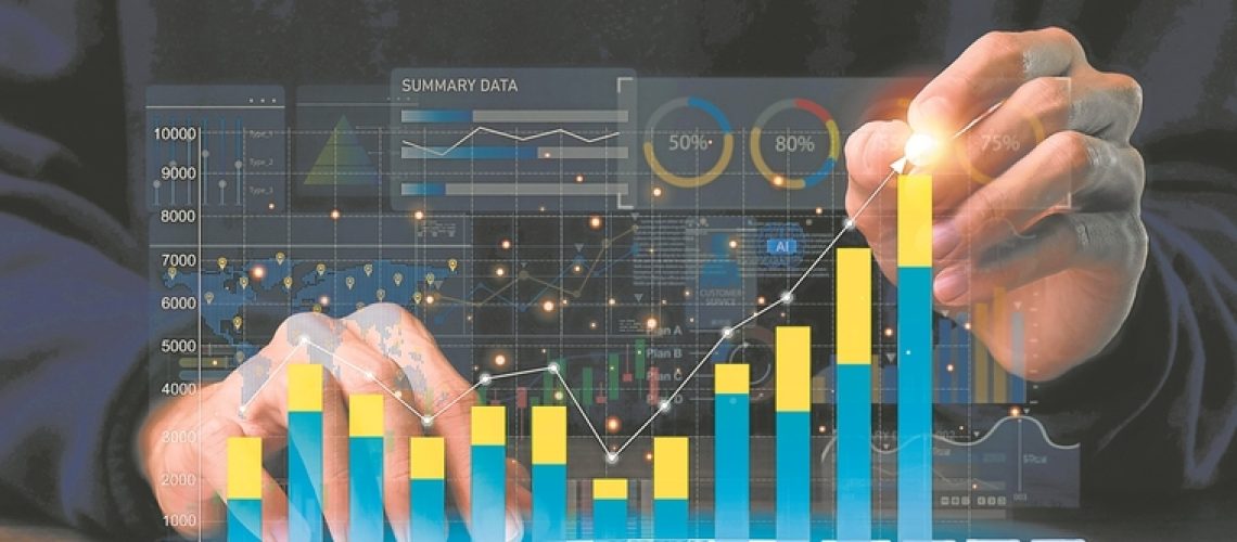 Businessman using tablet analyze sales data and economic growth graph chart and report with KPI and metrics connected to the database. Business planning and strategy.Technology digital marketing.